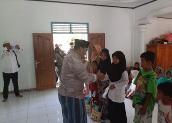 Ketua BPD Bersama Kades Muaro Mensao Dampingi IRSP Santuni Anak Yatim