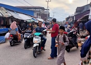 HPN, Gabungan Aliansi Wartawan Tanjabbar Bagikan Ribuan Masker 