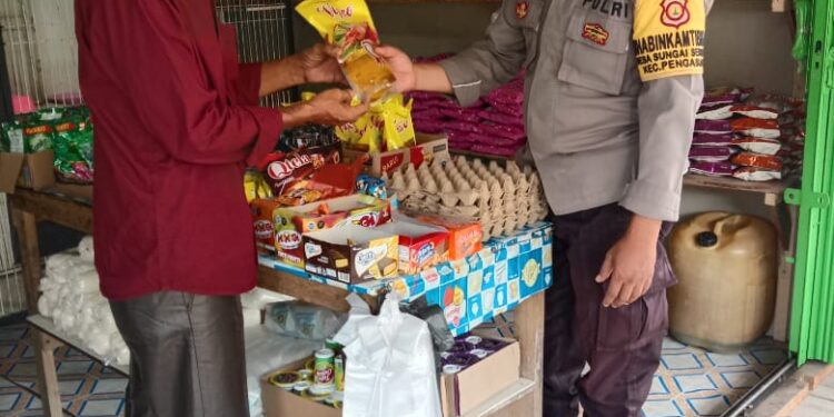 Kapolsek Pengabuan Terun Langsung ke Pasar Tradisional Cek Ketersediaan Migor 