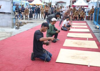 Bupati Anwar Sadat Saksikan Final Gasing, Serukan Semangat HUT RI dan Hari Jadi Tanjab Barat
